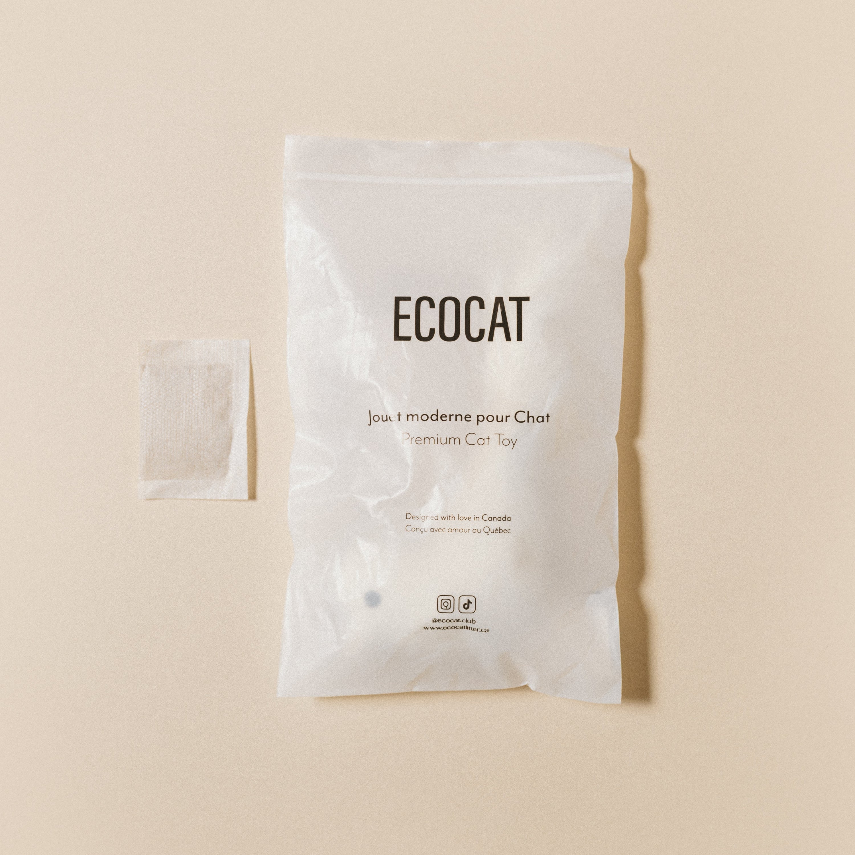 ECOCAT product packaging on a beige background